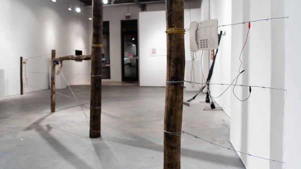 Phil Peters and David Rueter, Phil Peters and David Rueter, Barbed Wire Fence Telephone, 2014, Wood, barbed wire, telephones, batteries, electrical wire